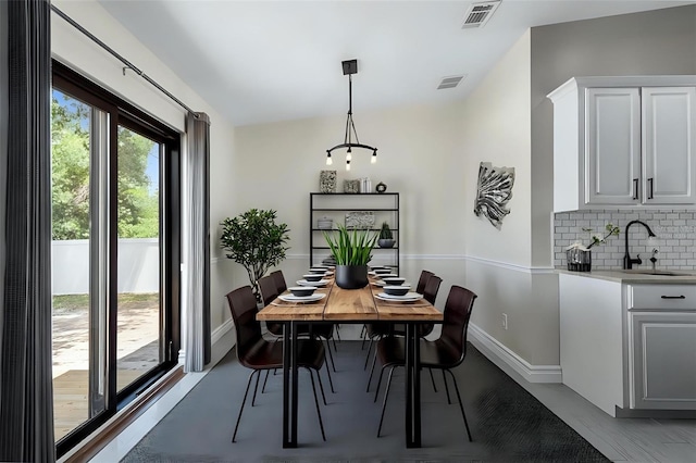 4305 Heyward St, North Port, FL 34291 - dining room featuring baseboards