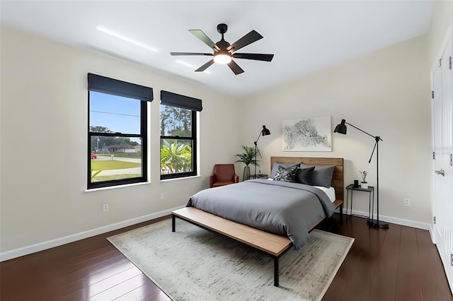 4305 Heyward St, North Port, FL 34291 - bedroom featuring dark wood-type flooring, baseboards, and a ceiling fan