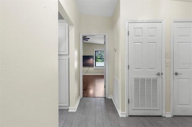 4305 Heyward St, North Port, FL 34291 - hallway featuring wood finished floors and baseboards