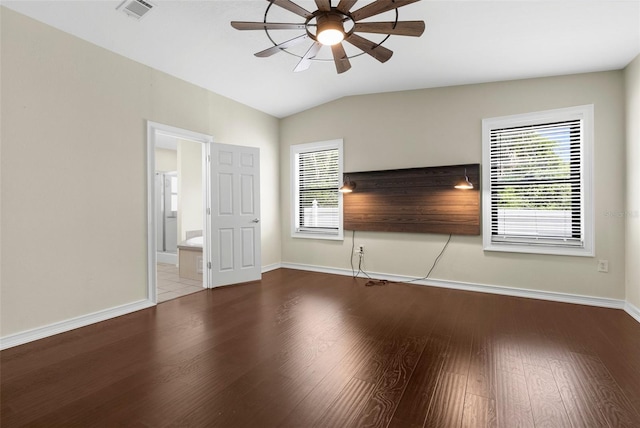 4305 Heyward St, North Port, FL 34291 - unfurnished room featuring ceiling fan, wood finished floors, baseboards, plenty of natural light, and vaulted ceiling