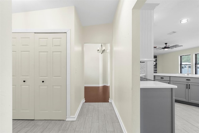 4305 Heyward St, North Port, FL 34291 - corridor featuring wood tiled floors and baseboards