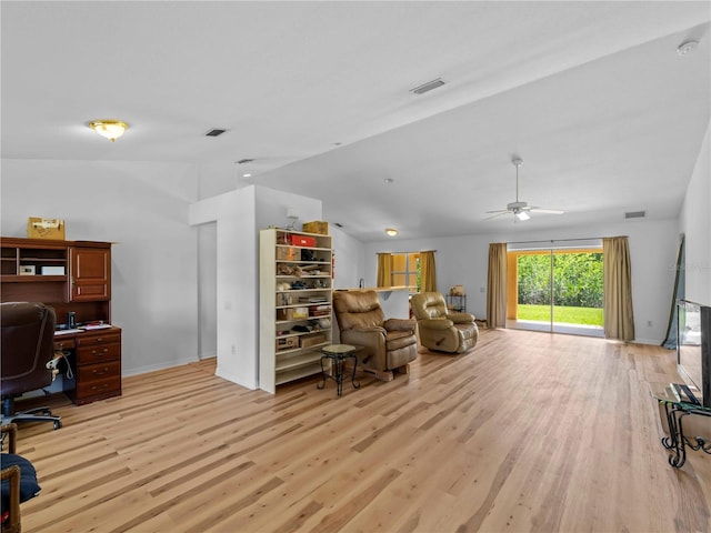 6199 Stamp St, Port Charlotte, FL 33981 - office area featuring light wood finished floors, lofted ceiling, a ceiling fan, and baseboards