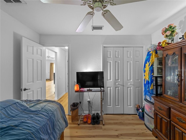 6199 Stamp St, Port Charlotte, FL 33981 - bedroom with light wood-style flooring, a closet, and a ceiling fan