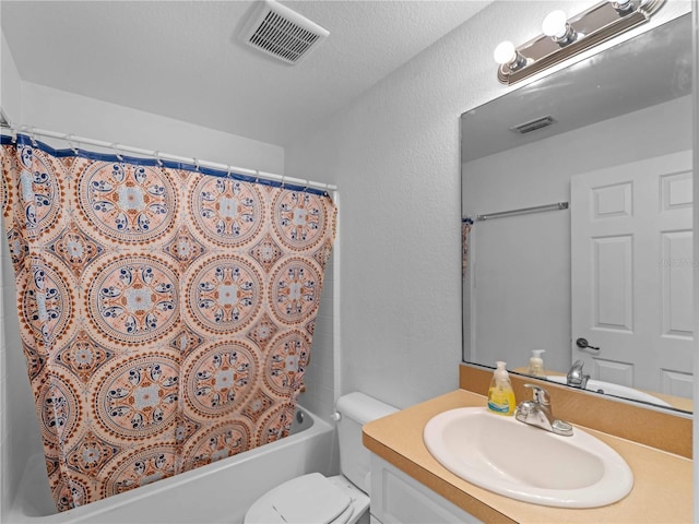 6199 Stamp St, Port Charlotte, FL 33981 - full bathroom with vanity, toilet, shower / bathtub combination with curtain, and a textured wall
