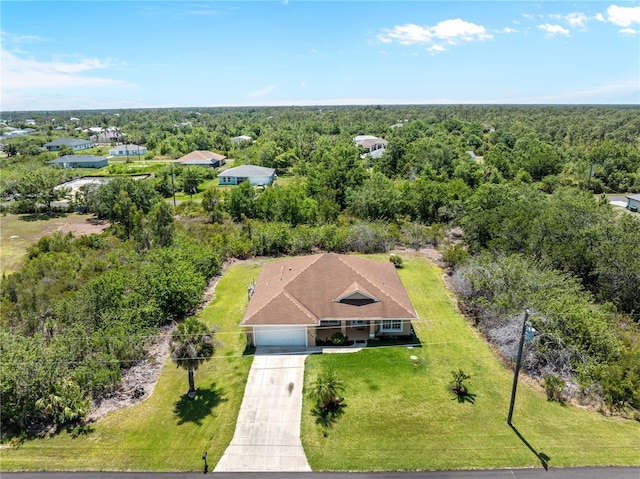 6199 Stamp St, Port Charlotte, FL 33981 - aerial view of property and surrounding area featuring a forest