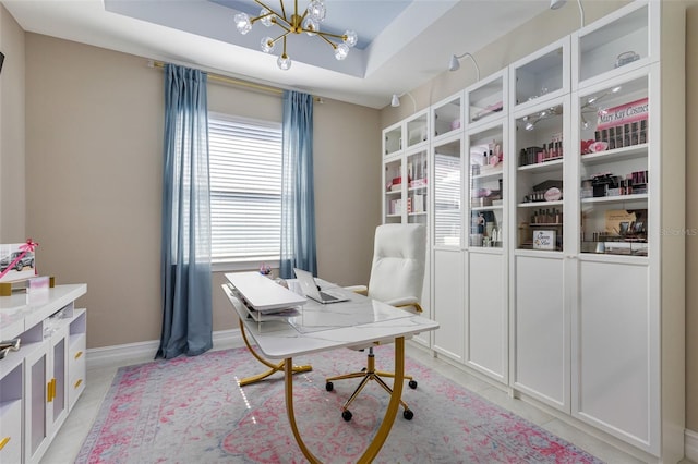 629 Ibiza Loop, Venice, FL 34292 - office featuring a chandelier, baseboards, and a raised ceiling