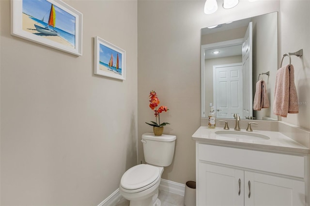 629 Ibiza Loop, Venice, FL 34292 - bathroom featuring vanity, toilet, and baseboards