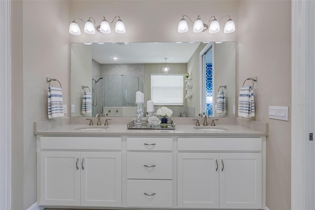 629 Ibiza Loop, Venice, FL 34292 - bathroom featuring a stall shower and double vanity