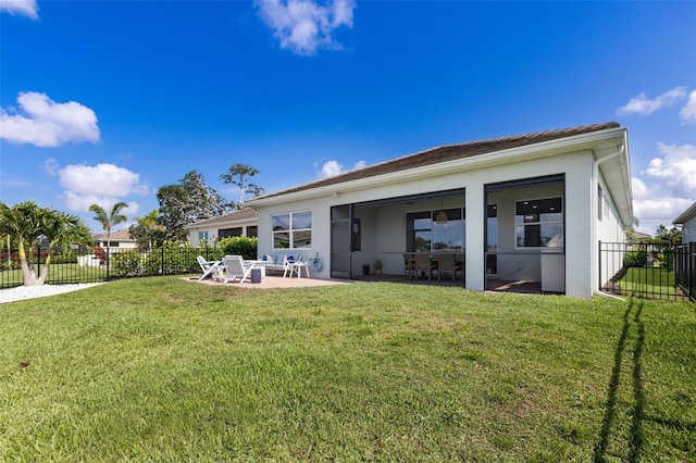 629 Ibiza Loop, Venice, FL 34292 - rear view of property featuring a patio area and stucco siding
