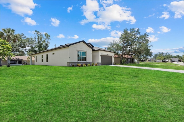 4390 Asteria Ter, North Port, FL 34287 - ranch-style home featuring concrete driveway, a garage, stucco siding, and a front yard
