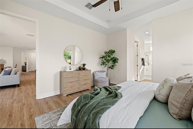 4390 Asteria Ter, North Port, FL 34287 - bedroom with wood finished floors, baseboards, ceiling fan, and recessed lighting