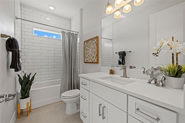4390 Asteria Ter, North Port, FL 34287 - bathroom featuring toilet, vanity, shower / tub combo with curtain, and tile patterned flooring