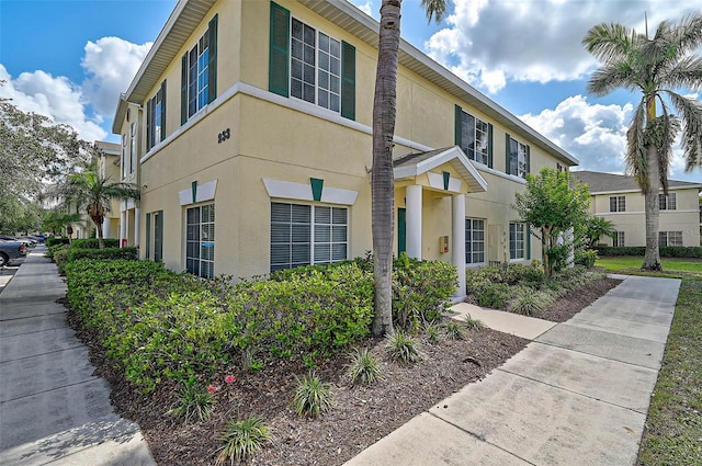 view of front of property featuring stucco siding