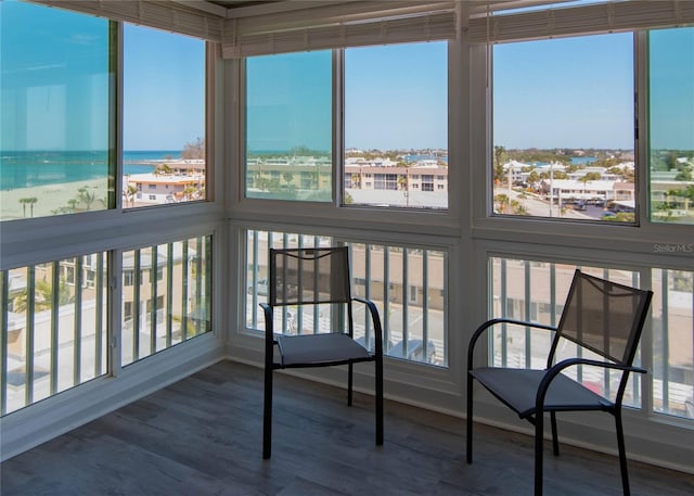 1255 Tarpon Center Dr Unit 604, Venice, FL 34285 - sunroom featuring plenty of natural light and wood finished floors