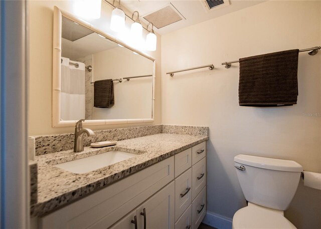 1255 Tarpon Center Dr Unit 604, Venice, FL 34285 - bathroom featuring toilet and vanity