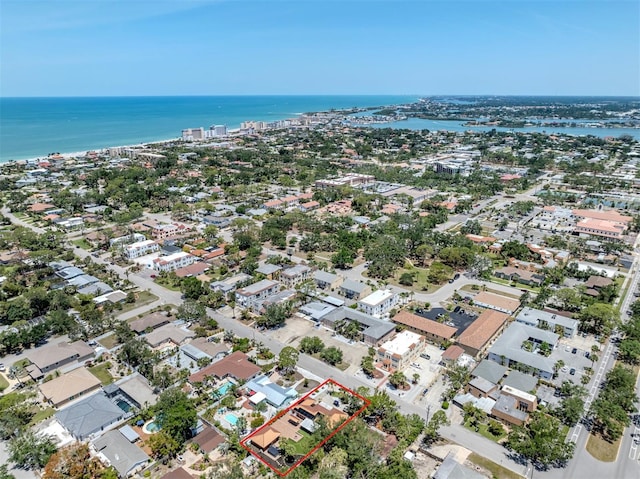 aerial overview of property's location featuring property boundaries highlighted and a nearby body of water