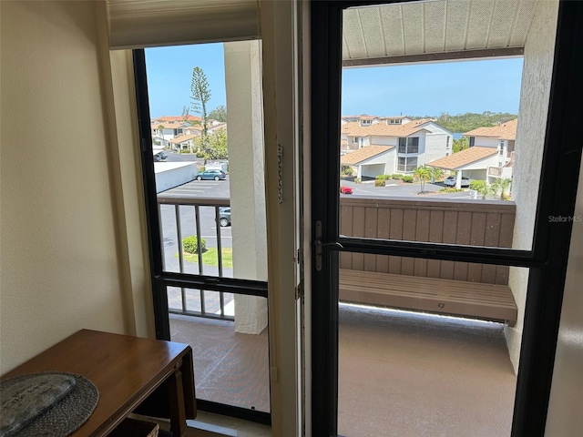 1154 Bird Bay Way Unit 303, Venice, FL 34285 - entryway featuring a residential view and a textured wall