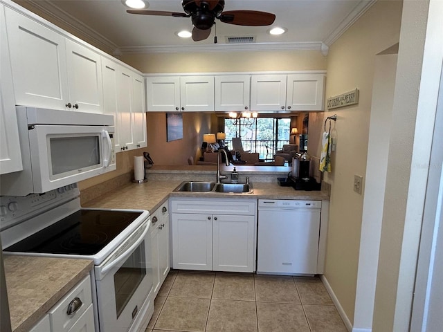 1154 Bird Bay Way Unit 303, Venice, FL 34285 - kitchen featuring white appliances, a sink, ceiling fan, ornamental molding, and light tile patterned floors