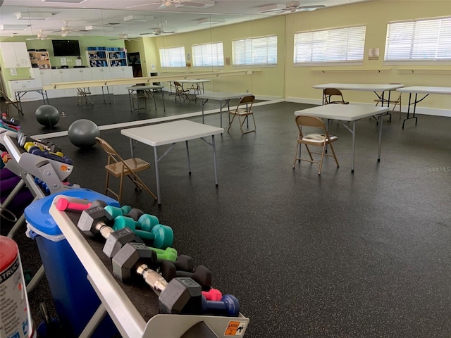 1154 Bird Bay Way Unit 303, Venice, FL 34285 - game room featuring baseboards, rubber floors, and ceiling fan
