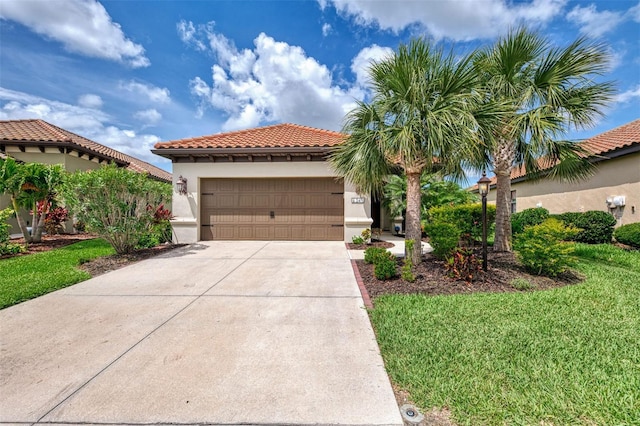 241 Marcheno Way, Nokomis, FL 34275 - mediterranean / spanish home featuring a tiled roof, stucco siding, a garage, concrete driveway, and a front yard