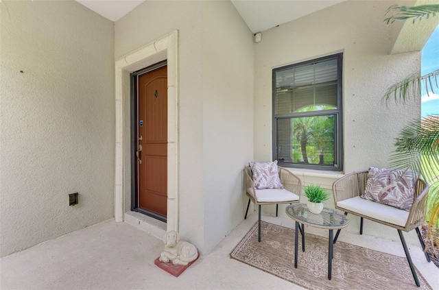 241 Marcheno Way, Nokomis, FL 34275 - view of exterior entry featuring stucco siding