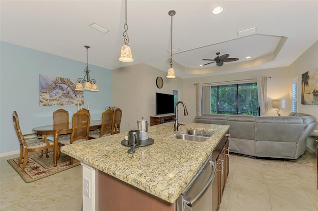 241 Marcheno Way, Nokomis, FL 34275 - kitchen with a sink, open floor plan, stainless steel dishwasher, a tray ceiling, and a ceiling fan