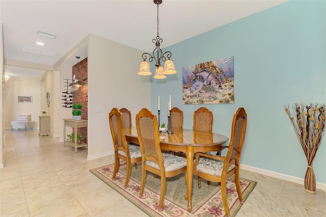 241 Marcheno Way, Nokomis, FL 34275 - dining room with a chandelier and baseboards