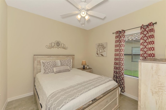 241 Marcheno Way, Nokomis, FL 34275 - bedroom with light tile patterned flooring, baseboards, and ceiling fan