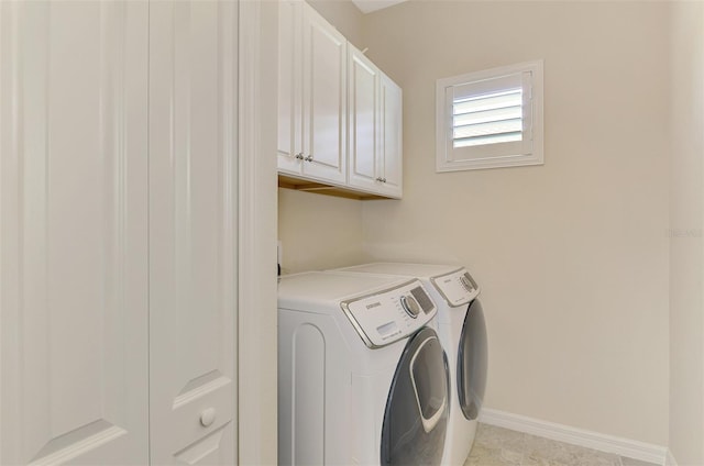 241 Marcheno Way, Nokomis, FL 34275 - laundry room with independent washer and dryer, cabinet space, and baseboards