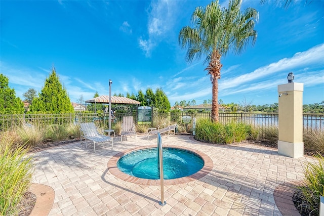 241 Marcheno Way, Nokomis, FL 34275 - view of swimming pool with a fenced backyard, a community hot tub, a patio, and a water view