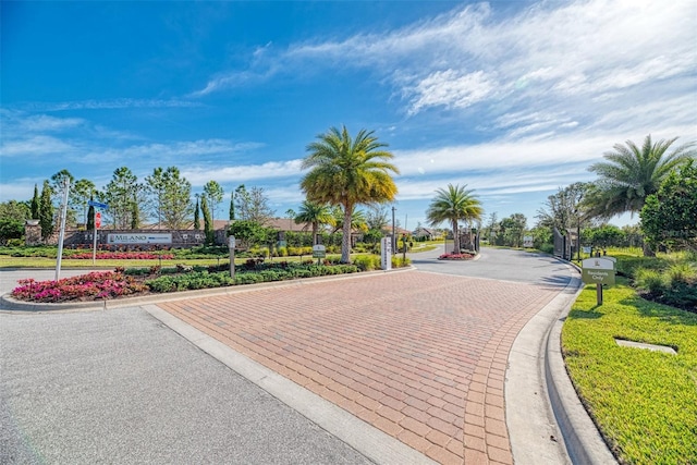 241 Marcheno Way, Nokomis, FL 34275 - view of decorative road featuring curbs and a gated entry