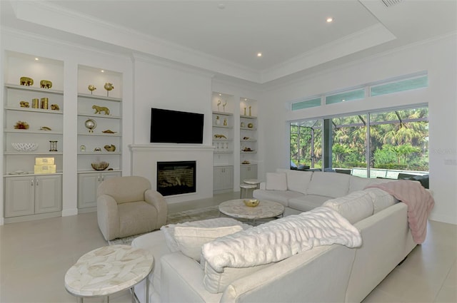 9048 Luna Ln, Sarasota, FL 34241 - living area with built in features, ornamental molding, a glass covered fireplace, and recessed lighting