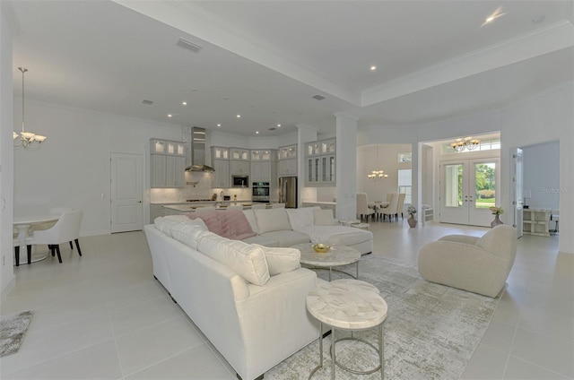 9048 Luna Ln, Sarasota, FL 34241 - living area featuring a chandelier, light tile patterned floors, crown molding, french doors, and recessed lighting