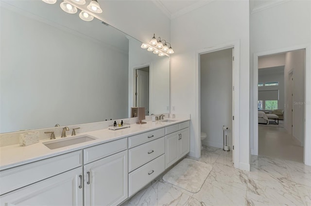 9048 Luna Ln, Sarasota, FL 34241 - full bathroom with toilet, ornamental molding, double vanity, marble finish flooring, and baseboards