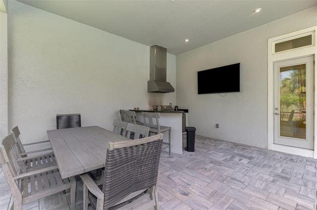 9048 Luna Ln, Sarasota, FL 34241 - view of patio / terrace featuring an outdoor kitchen and outdoor dining area