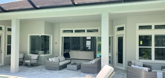 9048 Luna Ln, Sarasota, FL 34241 - view of patio featuring outdoor lounge area and french doors