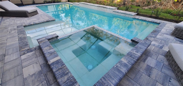 9048 Luna Ln, Sarasota, FL 34241 - view of pool with a pool with connected hot tub and a patio