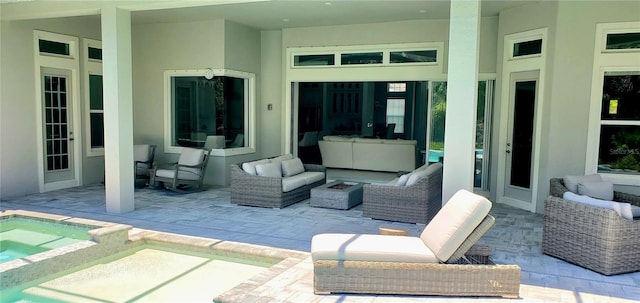 9048 Luna Ln, Sarasota, FL 34241 - view of patio featuring an outdoor living space, an in-ground hot tub, and french doors