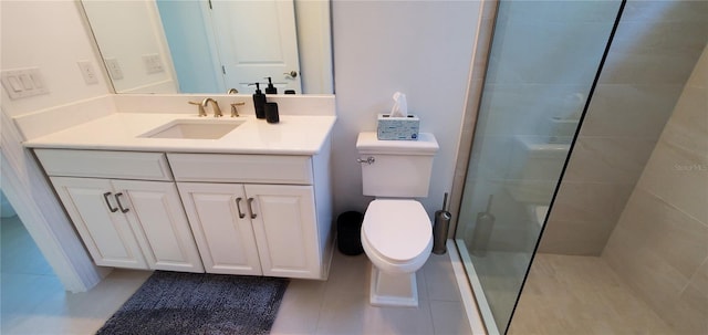 9048 Luna Ln, Sarasota, FL 34241 - bathroom featuring toilet, a stall shower, vanity, and tile patterned floors