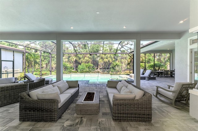 9048 Luna Ln, Sarasota, FL 34241 - view of patio / terrace with an outdoor living space with a fire pit, an outdoor pool, and a lanai