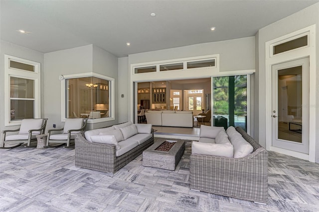 9048 Luna Ln, Sarasota, FL 34241 - living room featuring a chandelier and recessed lighting