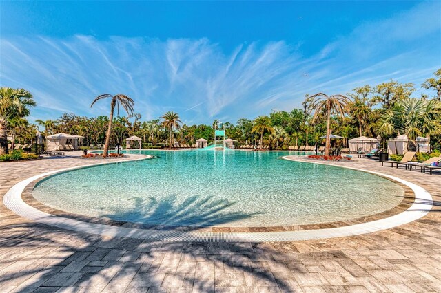 9048 Luna Ln, Sarasota, FL 34241 - community pool with a patio area