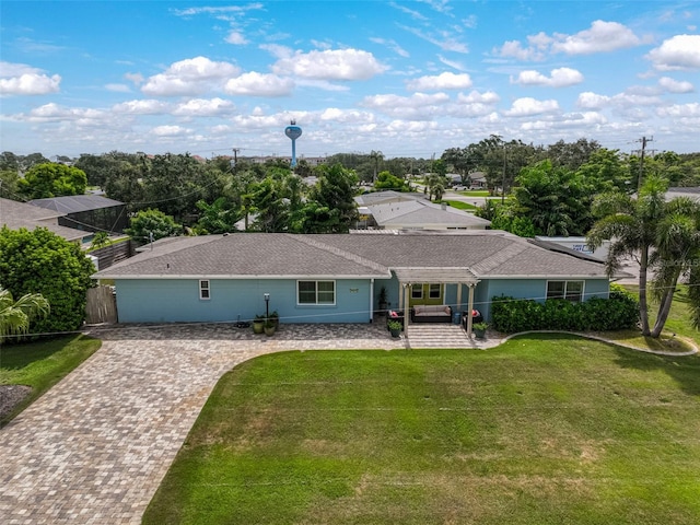 1099 Nokomis Ave S, Venice, FL 34285 - single story home featuring a front yard, a patio, and driveway