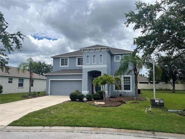5966 Willows Bridge Loop, Ellenton, FL 34222 - mediterranean / spanish-style home featuring stucco siding, an attached garage, concrete driveway, and a shingled roof