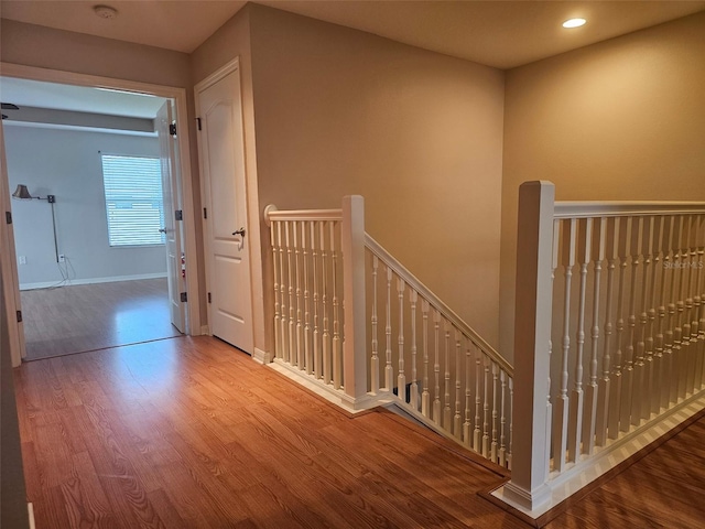 5966 Willows Bridge Loop, Ellenton, FL 34222 - hallway with an upstairs landing, wood finished floors, and recessed lighting