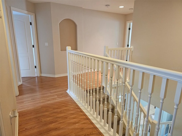 5966 Willows Bridge Loop, Ellenton, FL 34222 - corridor with an upstairs landing, wood finished floors, and recessed lighting
