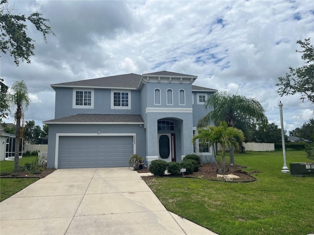 5966 Willows Bridge Loop, Ellenton, FL 34222 - view of front of property with stucco siding, a garage, driveway, and roof with shingles