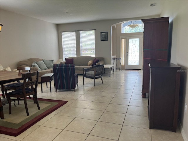 5966 Willows Bridge Loop, Ellenton, FL 34222 - living room featuring arched walkways and light tile patterned floors
