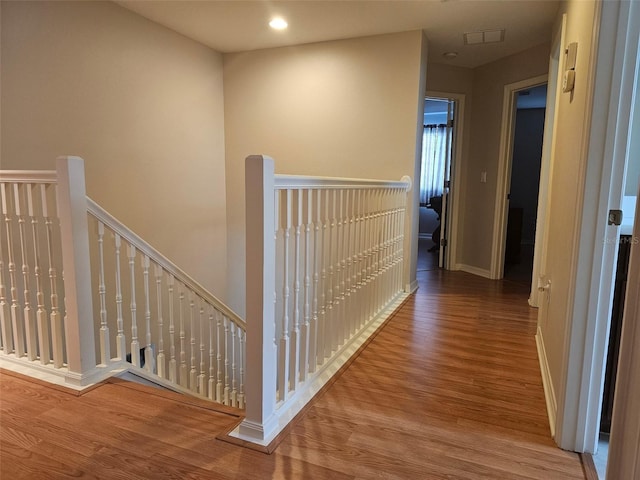 5966 Willows Bridge Loop, Ellenton, FL 34222 - hall with an upstairs landing, wood finished floors, and recessed lighting