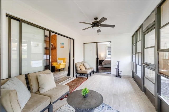 1439 Strada D Argento, Venice, FL 34292 - sunroom with ceiling fan and an outdoor hangout area
